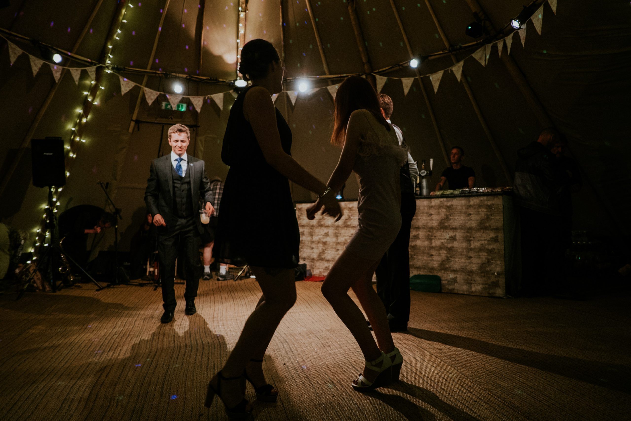 Wedding Entertainers and People Dancing at an Event